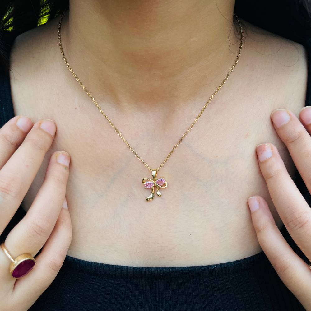 PINK BOW CHARM NECKLACE