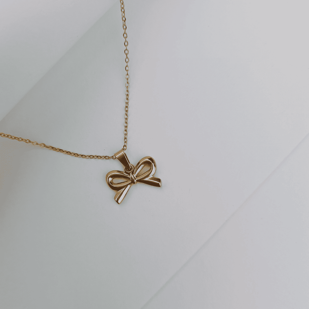 BOW CHARM NECKLACE