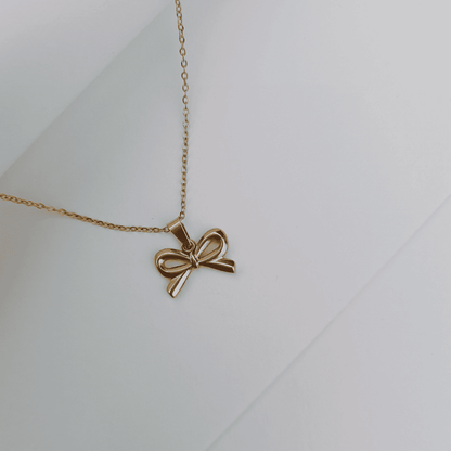 BOW CHARM NECKLACE