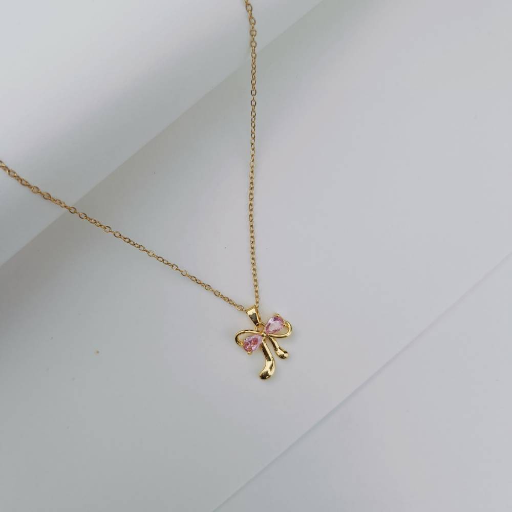 PINK BOW CHARM NECKLACE